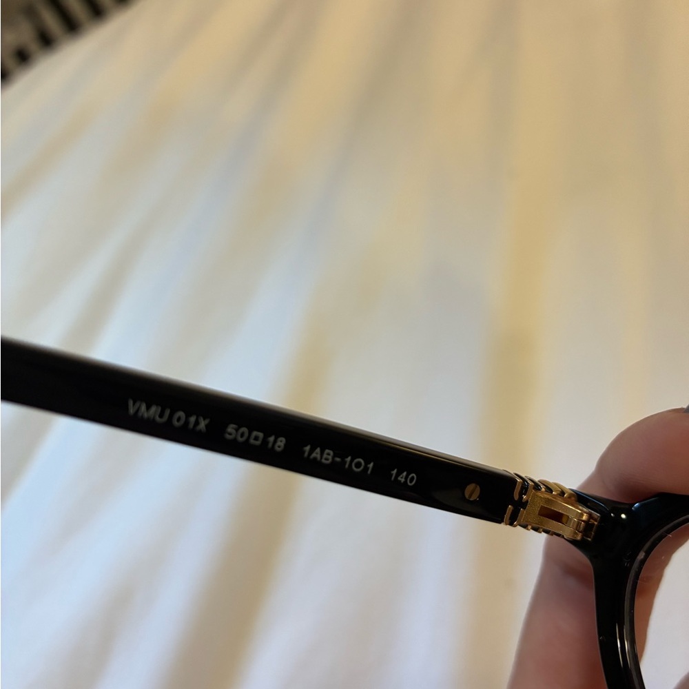 Miu Miu Black and Gold Eyewear - Picture 3 of 4